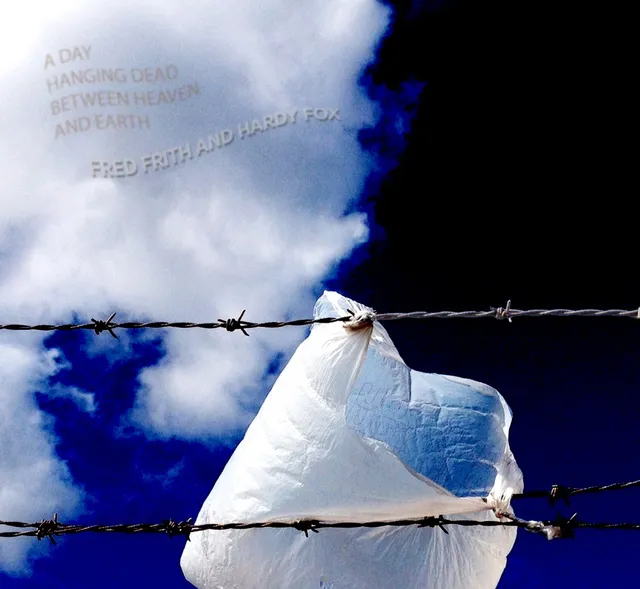 A Day Hanging Dead Between Heaven and Earth 封面